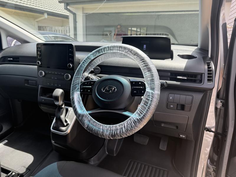 Hyundai Staria dash with the steering wheel covered